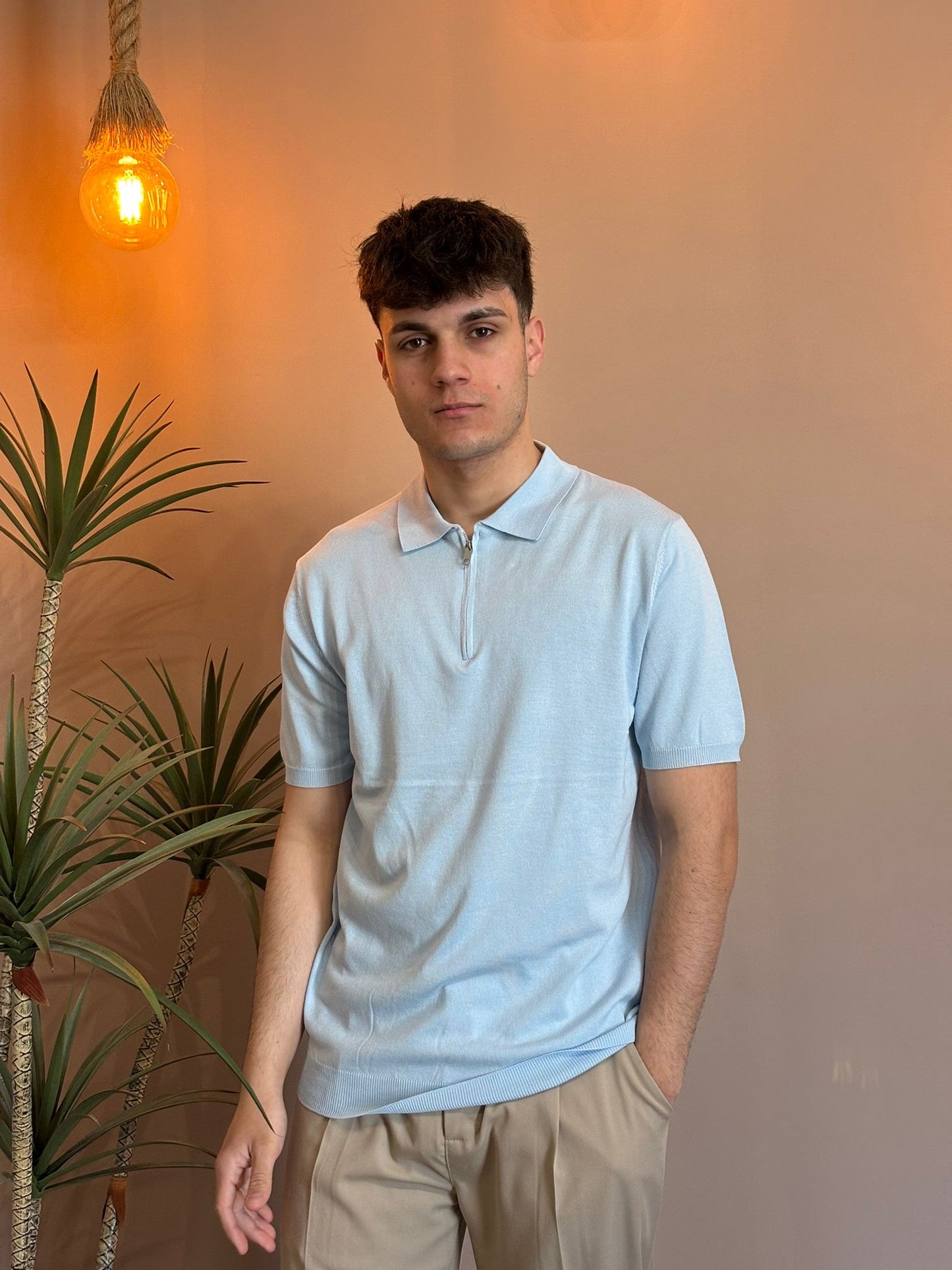 Polo zip filo celeste
