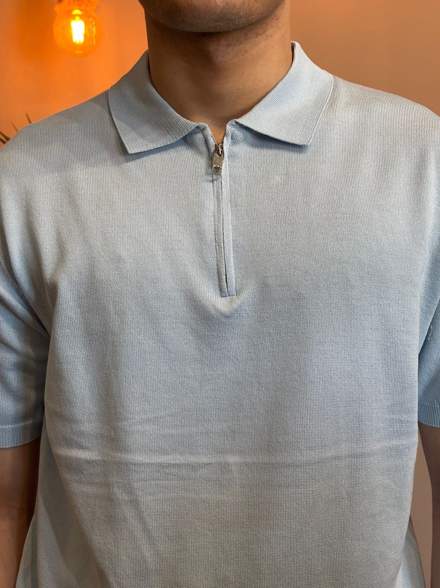 Polo zip filo celeste